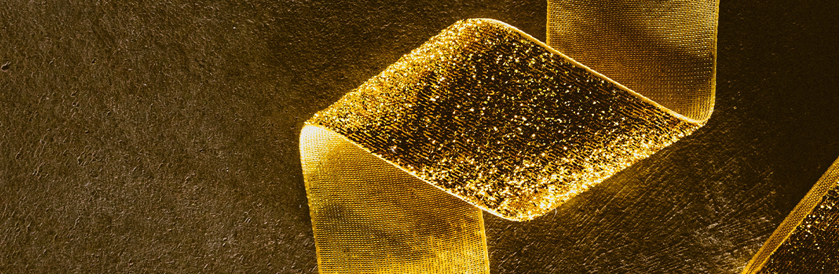 Rieger Metallveredlung Blog - Wir feiern unser 70. Jubiläum – Vergoldete Teile aus Stoff